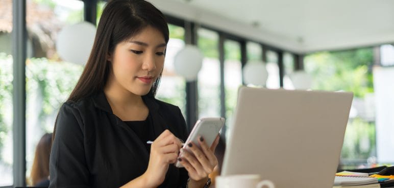 modern business woman working with smartphone in office